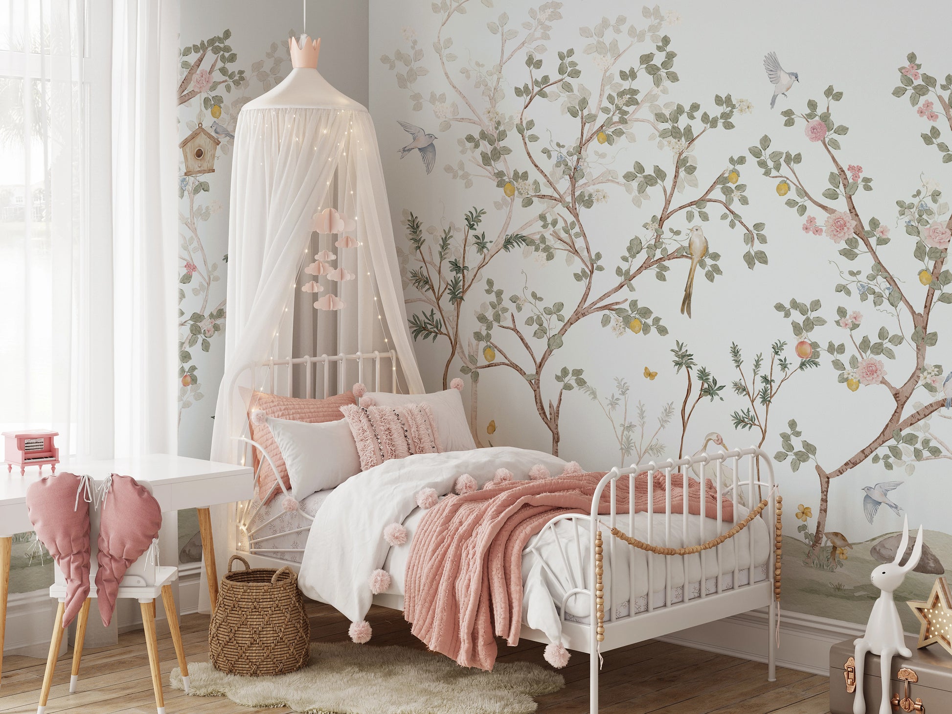 Children's bedroom with pale blue Meadowsong Mural in Reverie colorway, white canopy bed, and pink accents.