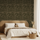 Modern bedroom with a brown bed and dark botanical feature wall
